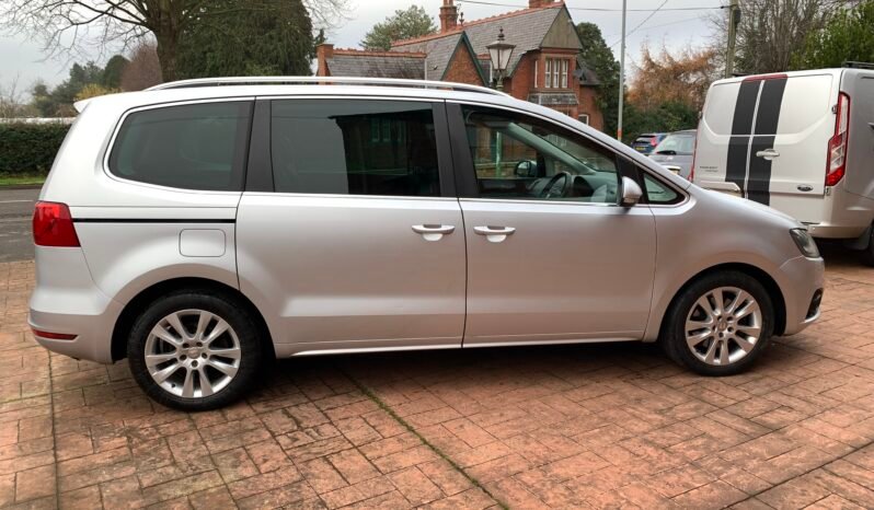 Monnow Taxi silver 7-seater MPV, side view